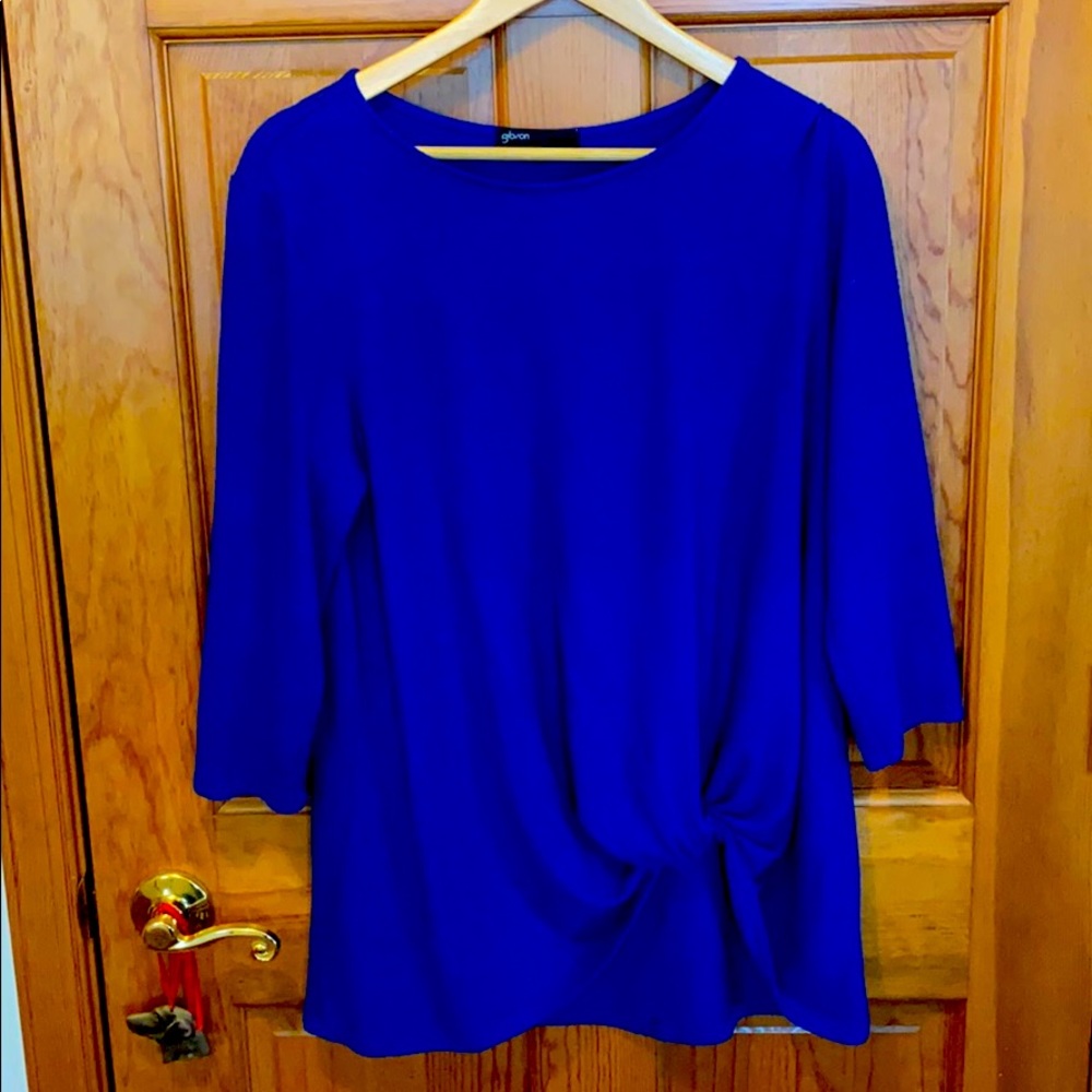 Royal blue sweater.